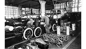 October 7: Ford Motor Company introduces the first moving assembly line.