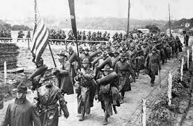 The first American troops land in France.