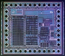 The monolithic integrated circuit (IC) chip