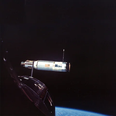 First propulsion maneuver with docked Agena (Gemini X)