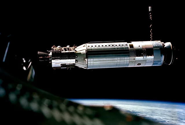 First docking of crewed and uncrewed spacecraft (Gemini VIII with Agena)
