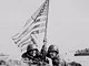 U.S. Soldiers plant american flag