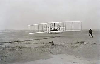 The airplane by the Wright brothers, Orville Wright and Wilbur Wright