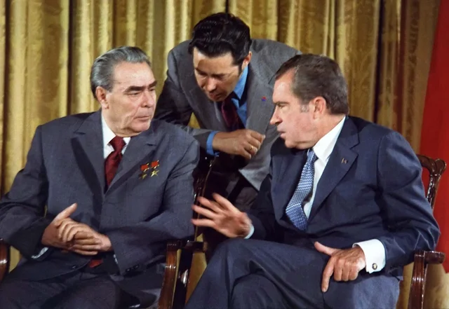 The Gulf of Tonkin Incident occurs and the United States' Congress passes the Gulf of Tonkin Resolution and Leonid Brezhnev becomes the leader of the Soviet Union.