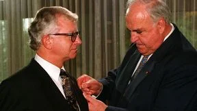 Estonia, Latvia, and Lithuania declare their independence and East and West Germany reunite under Chancellor Helmut Kohl.