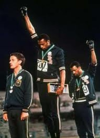 At the Mexico City Olympics, Ashe participates in a protest by black athletes about the South African Apartheid.