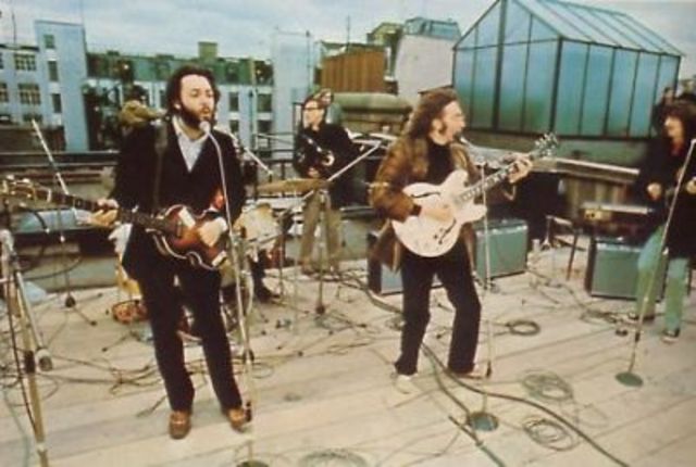 The Beatles give their last public performance