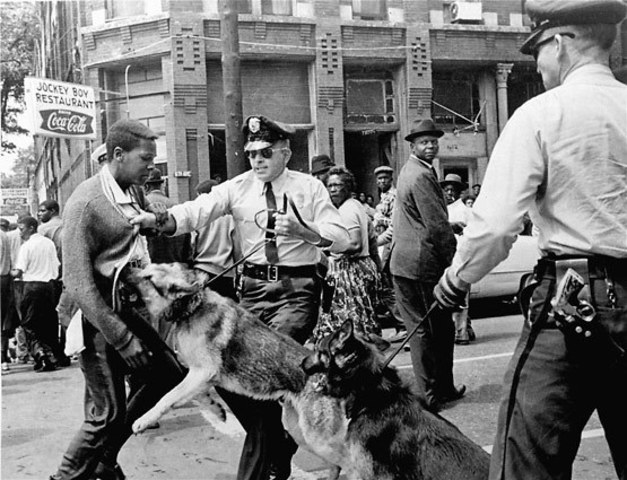 Peaceful demonstrators attacked in Bermingham, Alabama.