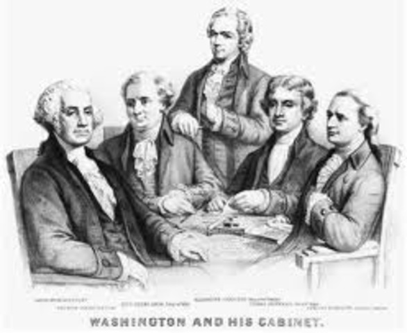 George Washington becomes President and creates the cabinet.
