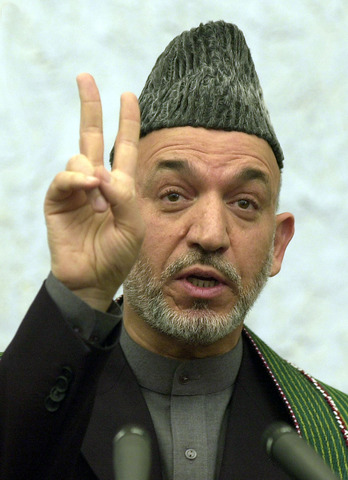 Karzai becomes president