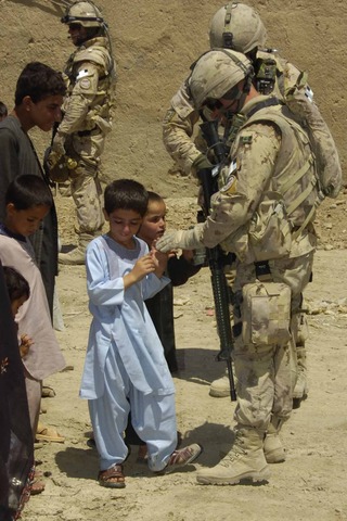 NATO takes command of the ISAF mission