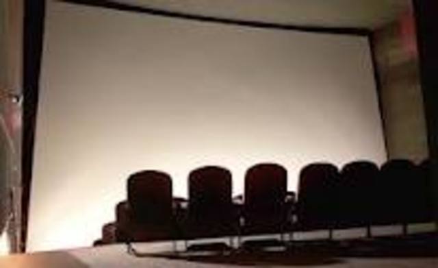 Mildred asks Montag if they can buy a TV-Wall