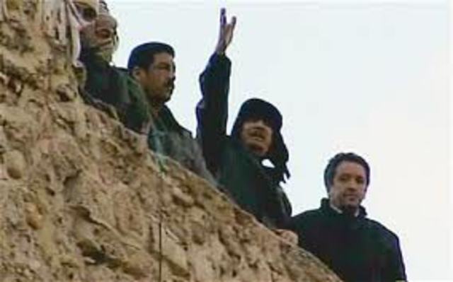 As Libya uprising reaches Tripoli Gaddafi vows to 'open up the arsenals'