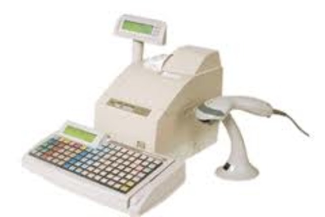 Η ΑΒ Βασιλόπουλος αλλάζει τις συμβατικές ταμειακές μηχανές με μηχανές αυτόματης ανάγνωσης γραμμάτων κωδικών.