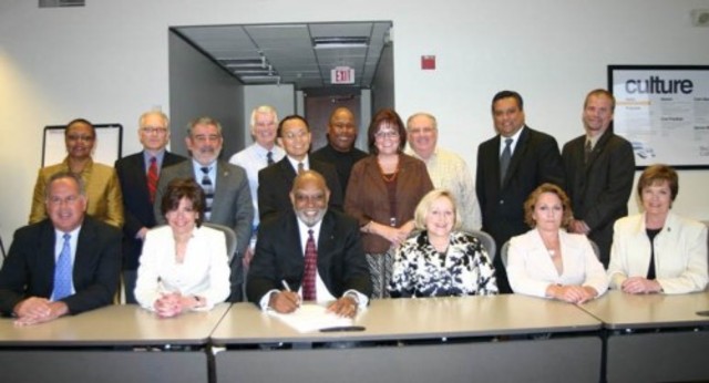 Chancellor signs the ACUPCC