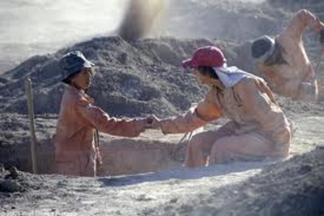 In the tent and his first hole.
