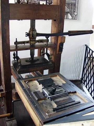 ค.ศ. 1439**: การประดิษฐ์เครื่องพิมพ์โดย **Johannes Gutenberg**