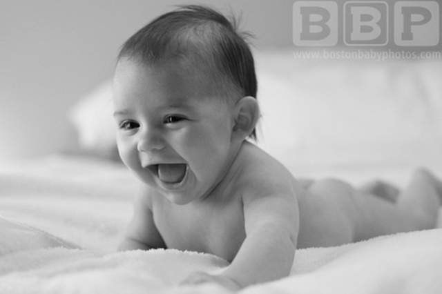 3 months old A baby can hold its head up and reach for objects.