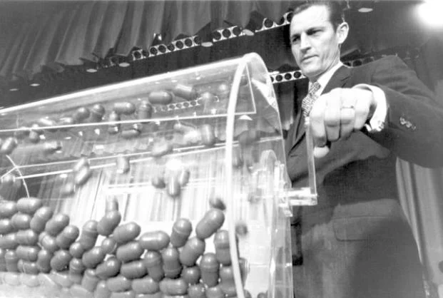 Vietnam draft lottery begins.
