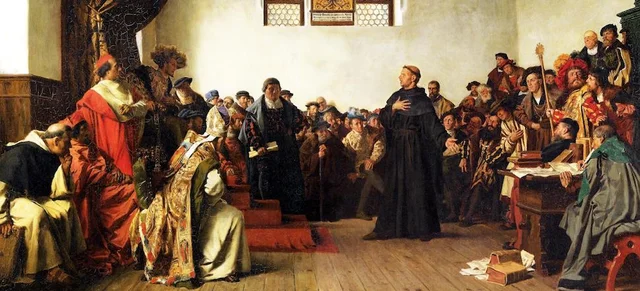 Martin Luther is excommunicated and declared a heretic
