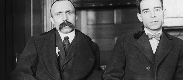 Sacco and Vanzetti arrested for armed robbery and murder