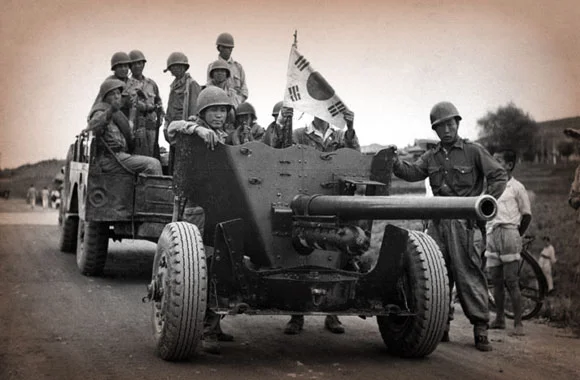 The UN agrees to form an army under US command to defend South Korea.