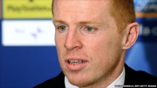 Niel lennon books his flight to Manchester