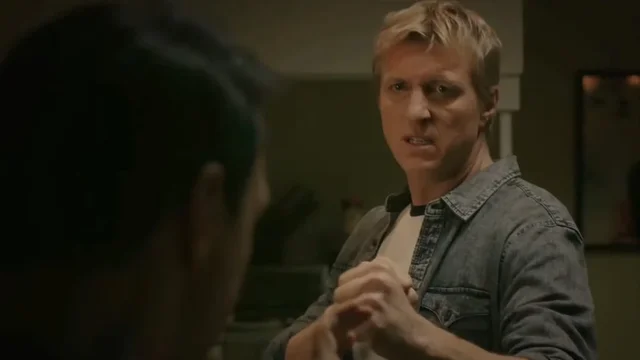 Daniel fights Johnny at his apartment