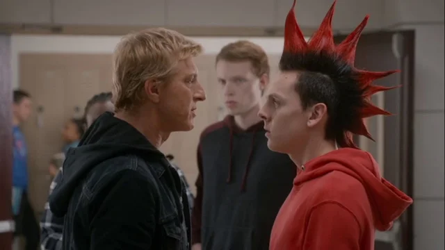 Johnny recruits students for his new dojo