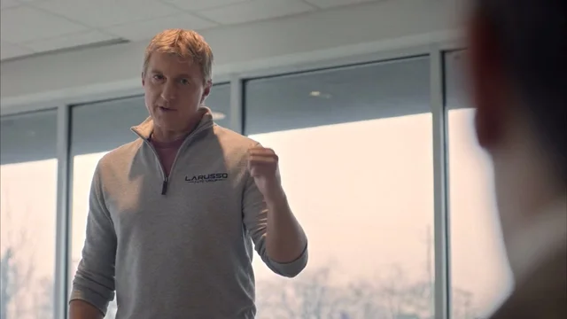 Johnny starts working at LaRusso Auto