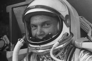 First man to orbit the earth from USA