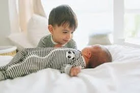 Brother being born