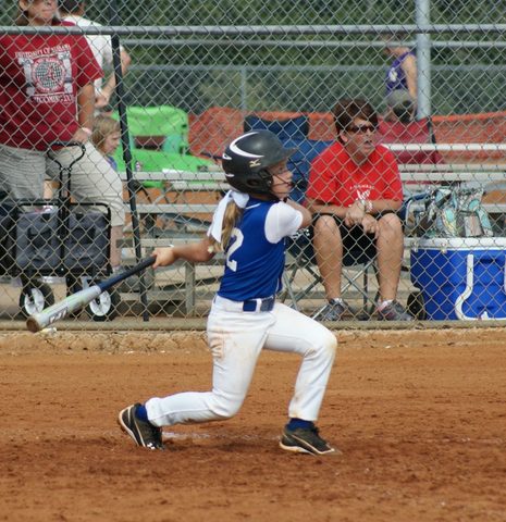 Claire's first hit over the fence