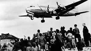 Berlin Airlift occurs and Czechoslovakia becomes the last Eastern European to become Communist