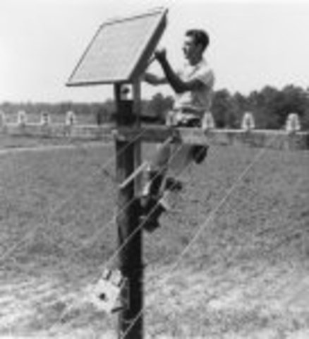 Installation of first solar panel, on rural Georgia phone pole, Oct. 4, 1955. Courtesy of Alcatel-Lucent Bell Lab