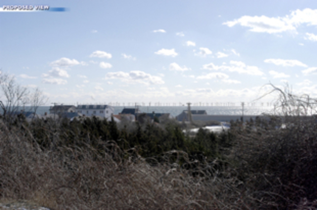 Cape Wind Associates stage a public hearing with the Cape Cod Commission and public officials present their first wind power farm initaive, which is still in th eprocess of being approved.