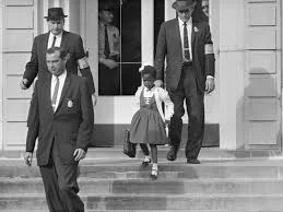 Ruby Bridges desegregate elementary school in New Orleans