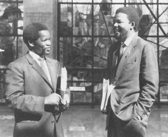 Mandela opens South Africa's first black law firm with Oliver Tambo.