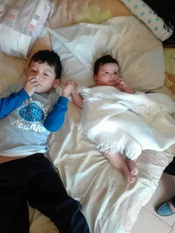 CON SU HERMANO NICOLAS