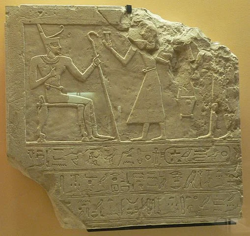 Mentuhotep II receiving offerings: Mentuhotep II, seated, holds the crook as a symbol of power. (c. 2000-1650 BCE)