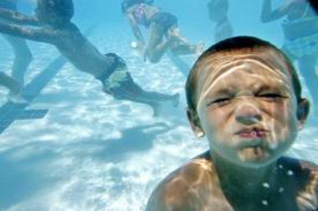 Brian swims out to the plane