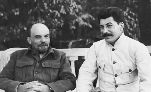Lenin dies, Stalin comes to power