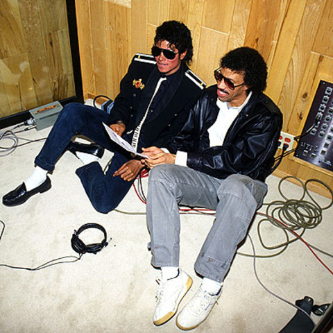 Jackson and Lionel Richie pen "We Are The World," with the proceeds from sales of the single slated for hunger relief in Africa.