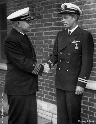 JFK recieves purple heart for heroics