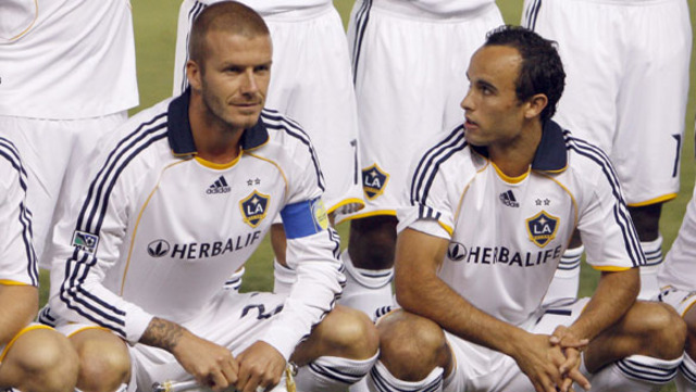 Manchester United makes history for being the first English team to win all 3 championships in the same year, and David captains the team.