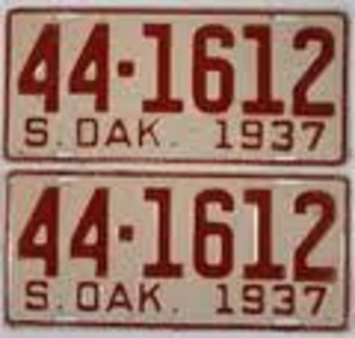1st permanent automobile license plates issued