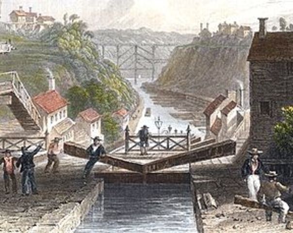 Construction of the Erie Canal begins.