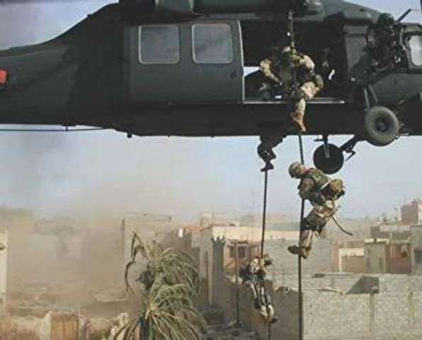 U.S. military forces land in Somalia.