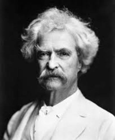 Mark Twain dies at age 74