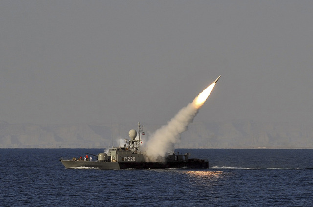 Iran rattles saber in Straight of Hormuz.